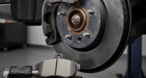 A blog banner image showing squeaky brakes in bad condition