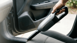 A blog banner image showing car vacuum