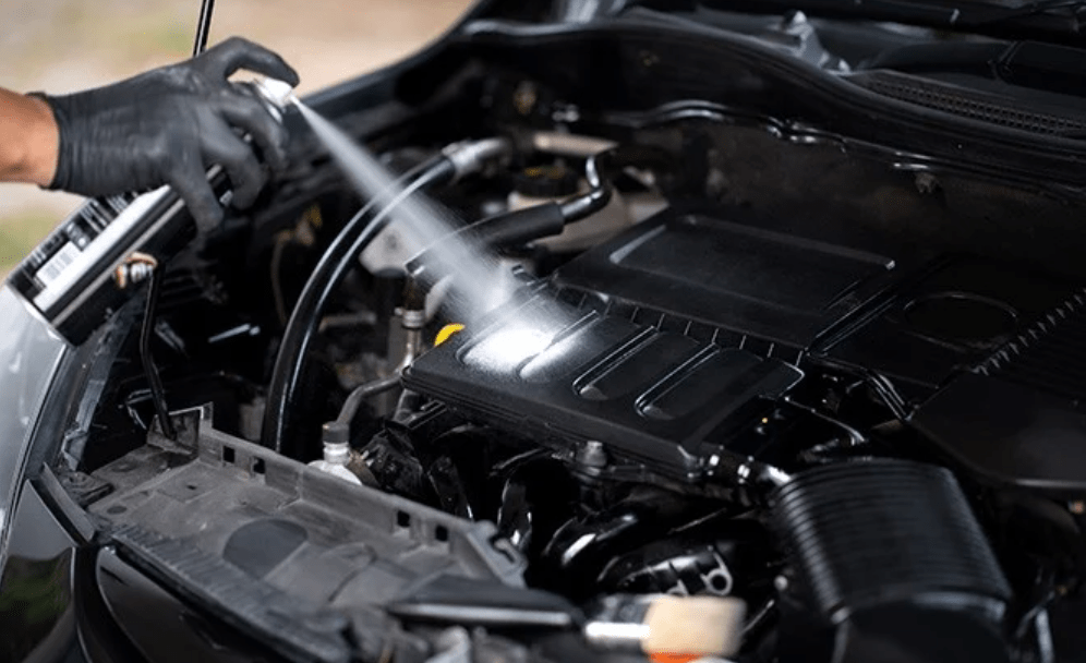 applying engine degreaser