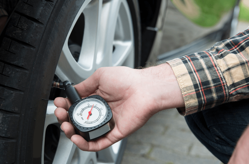 checking car tire pressure